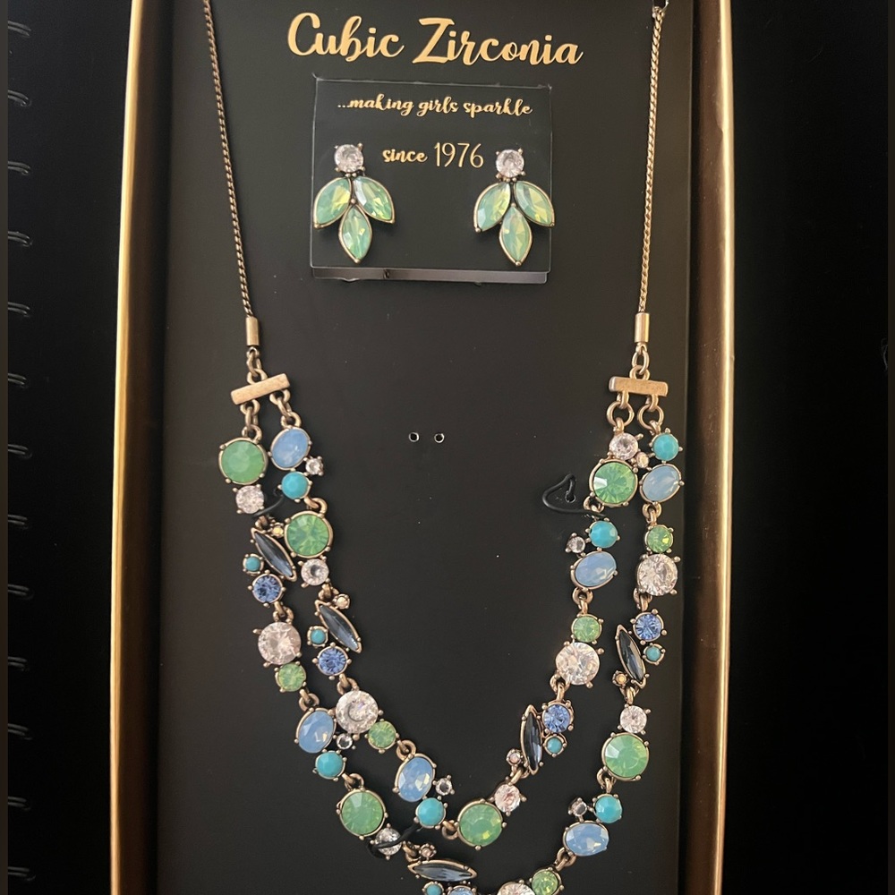 Cubic Zirconia 12”-30” Adjustable Necklace with matching earrings.